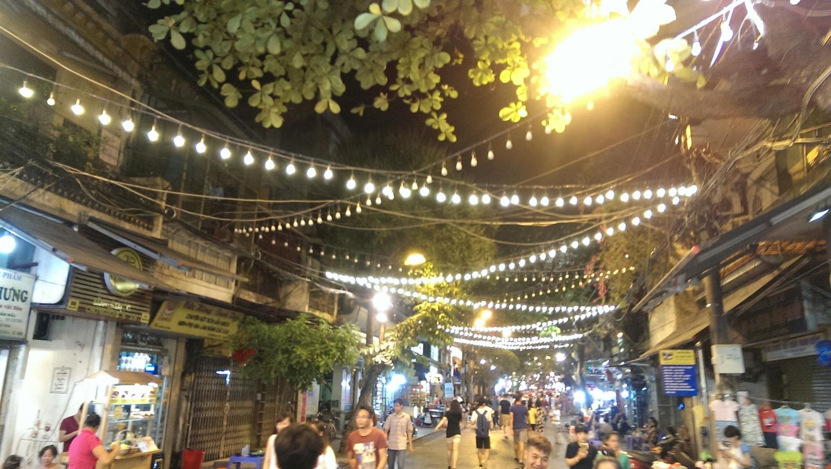 Experience the night market in Hanoi.